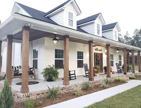 L Shape Porch Ideas, White House Black Windows Wood Accents, White Rustic House Exterior, White Farmhouse With Shutters, Small Farmhouse Exterior Ideas, Remodel Front Of House, Wood And White House, White House With Black And Wood Accents, Rustic House Design Exterior