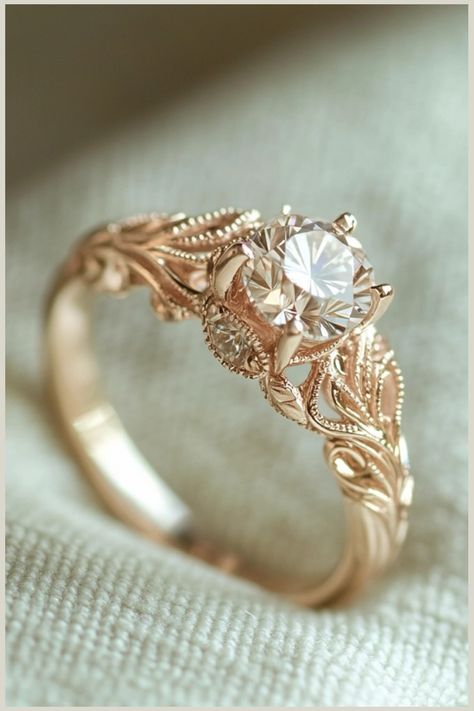 Discover the beauty of our vintage-inspired engagement ring, featuring exquisite detailing and a stunning center stone. Perfect for the romantic at heart. Vintage Heart Engagement Rings, Arabic Engagement Rings, Vintage Engagement Rings Filigree, Indian Wedding Rings Gold, Big Vintage Engagement Rings, Vintage Filigree Engagement Ring, Vintage Bridal Set, Engagement Ring Whimsical, Engagement Ring With Detailed Band