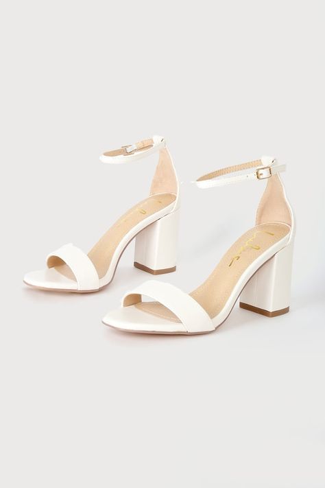 You're certain to step up your style essentials when you add the Lulus Arylee White Ankle Strap Heels to your closet! Smooth faux leather shapes a single toe strap, almond-shaped toe bed, and wrapped block heel. A dainty ankle strap rises from the sturdy heel cup and secures with a gold buckle. 3" wrapped block heel. Cushioned insole. Rubber sole has nonskid markings. Man made materials. Imported. Lulus | Arylee White Ankle Strap Heels | Size 10. Cute Honeymoon Outfits, Homecoming Shoes Heels, Honeymoon Dresses, Hoco Heels, Homecoming Heels, White Ankle Strap Heels, Graduation Heels, Bridesmaids Heels, Homecoming Shoes