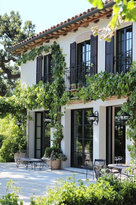 40 Charming French Mediterranean Homes You’ll Love Mediterranean Board And Batten, Spanish Mediterranean Exterior, Classic Mediterranean Homes, French Colonial House, French House Style, Mediterranean Revival Homes, Spanish House Colors, Parisian Exterior Home, Patina Homes Exterior