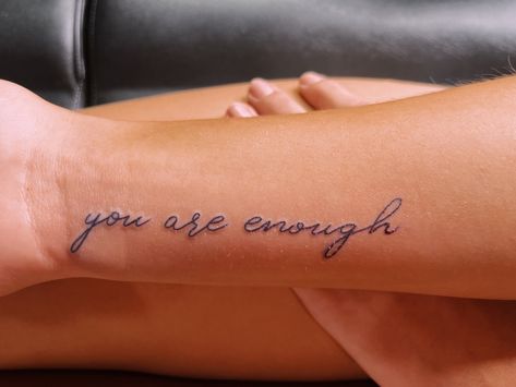 You Are Enough Cursive Tattoo, Cursive Name Tattoo With Butterfly, Enough Cursive Tattoo, You Are Enough Wrist Tattoo, Know You’re Enough Tattoo, You Are More Than Enough Tattoo, I Am Enough Quotes Tattoo With Butterfly, Jireh You Are Enough Tattoo, You’re Enough Tattoo