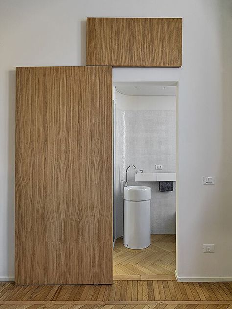 12 Successful Bathroom Door Ideas for Small Spaces - GoTinySpace Small Bathroom 2 Doors, Tiny House Bathroom Door, Doors For Small Openings, Small Toilet Door Ideas, Doors For Narrow Spaces, Doors For Awkward Spaces, Bathroom Door Small Space, Sliding Door Ideas For Small Spaces, Bedroom Bathroom Door Ideas