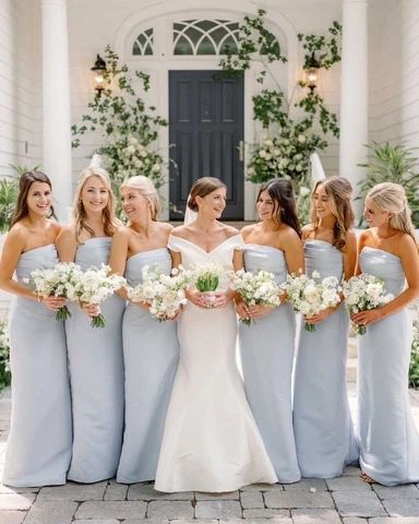 Light Blue Bridesmaid Dresses: How to Choose the Best Shade | Bella Bridesmaids Light Blue Bridesmaid Dresses, Women Standing, Light Blue Bridesmaid, Blue White Weddings, Light Blue Wedding, Something Blue Wedding, Spring Wedding Colors, Bella Bridesmaid, Blue Themed Wedding