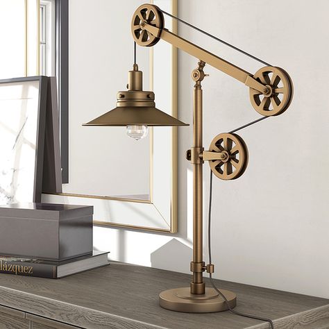 This brushed brass table lamp counterbalances function and design. It features an adjustable pulley system allowing you to personalize your space. Pulley System, Industrial Table Lamp, Bronze Table, Reading Lamp Floor, Cool Lamps, Metal Desks, Cfl Bulbs, Cool Floor Lamps, Brass Table Lamps