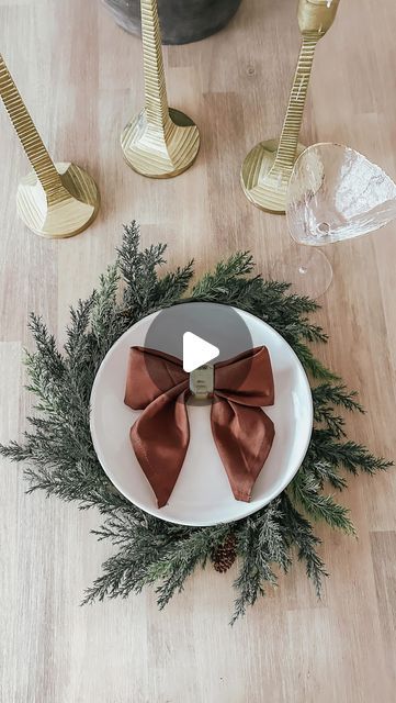 Jen Alvarez • Home Decor on Instagram: "How to make a bow napkin 🤎 comment “BOW” to get the link to shop this post straight to your inbox. This bow adds the cutest touch to a holiday table and is so easy to do ✨ save for later! link in bio to shop on my @shop.ltk / https://liketk.it/4qK2y #ltkhome #ltkholiday #ltkunder25 #amazonhome #amazonfinds #holidaytablescape #christmastable #foldinghacks #napkinfolding #napkinbow #bow #christmasdecor #christmastime #neutralchristmas" Napkin Bow Tie, Napkin Utensil Wrap, How To Use Napkin Rings Ideas, Folding Napkins For Napkin Rings, How To Fold A Napkin Into A Bow, How To Make A Bow Napkin, Thanksgiving Cloth Napkin Folds, How To Fold Napkins For Thanksgiving, Bow Napkin Fold