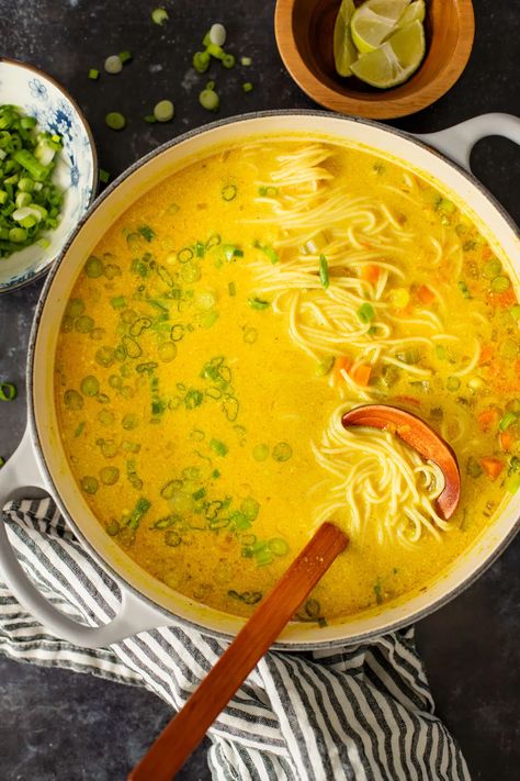 This Golden Coconut Noodle Soup is healthy & heart warming. A coconut curry broth, crispy baked tofu & tender rice noodles | ThisSavoryVegan.com #vegansoup #noodlesoup #healthysoup Vegan Creamy Noodle Soup, Vegan Ramen Soup Recipes, Coconut Veggie Soup, Vegetarian Broth Soup, Vegan Coconut Soup, Vegan Celery Soup, Asian Rice Noodle Soup, Tofu Soup Recipes, Easy Vegetarian Soup