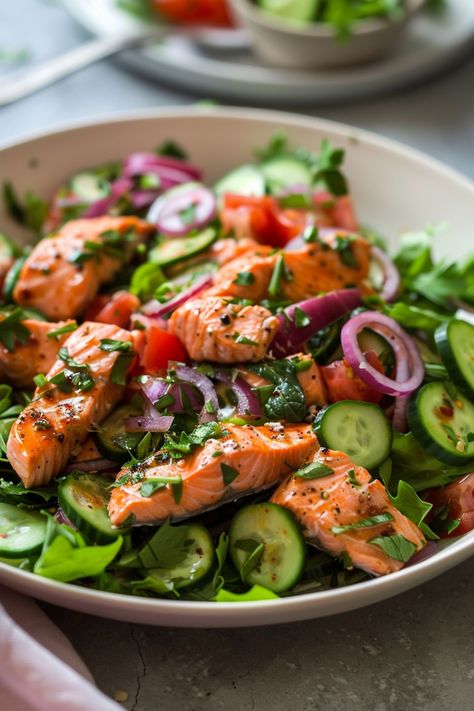 Indulge in the perfect balance of flavors with these delicious salmon salad recipes. Whether you're looking for a light and refreshing meal or a nutritious dish packed with omega-3s, there's a salmon salad recipe here to suit your taste. From bright citrus dressings to crunchy veggies and creamy avocado, these healthy salads are not only easy to make but also incredibly satisfying. Try out one of these salmon salad recipes today for a lunch or dinner option that's both tasty and good for you! Tasty Salads Healthy, Salmon In Salad, Easy Diet Salad Recipes, Salmon And Arugula Salad, Salmon On Salad, Nutritious Salad Recipes, Easy Salmon Salad, Refreshing Salads Summer, Salad Recipes With Salmon