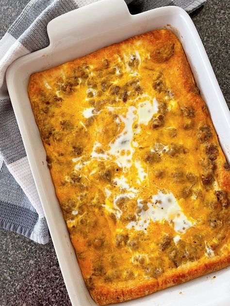 Start your day off right with a mouthwatering breakfast casserole that combines savory sausage, flaky crescent roll dough, and creamy eggs. This Crescent Roll breakfast casserole is the perfect way to fuel up for a busy morning or indulge in a leisurely brunch. Crescent Roll Sausage Egg Casserole, Crescent Sausage Breakfast Casserole, Overnight Croissant Breakfast Casserole, Breakfast Casserole Crescent Roll, Egg Casserole With Crescent Rolls, Breakfast Casserole With Crescent, Crescent Casserole, Breakfast Pizza Crescent Roll, Sausage Crescent