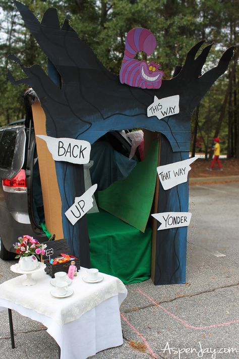 Creative and inexpensive ideas for creating a whimsical Alice in Wonderland scene for your upcoming Trunk or Treat! #aliceinwonderland #halloweentrunkortreat Zootopia Trunk Or Treat, Winter Trunk Or Treat Ideas, Trunk Or Treat Ideas Alice In Wonderland, Corpse Bride Trunk Or Treat, Fairytale Trunk Or Treat, Wonderland Trunk Or Treat Ideas, Disney Themed Trunk Or Treat Ideas, Trunk Or Treat Costumes, Alice And Wonderland Trunk Or Treat