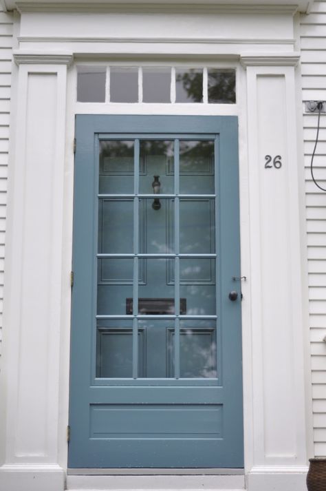 This looks like my storm door. Like what they've done with the hardware and matching paint with the main door. Painted Storm Door, Painted Exterior Doors, Exterior Door Designs, Diy Screen Door, Front Door Interior, Blue Front Door, Red Front Door, Black Shutters, Farmhouse Front Door