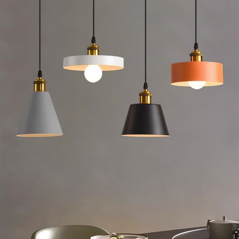 [FEATURE] 
 The Resin Geometric Pendant Lamp is a stylish lighting fixture with a minimalist and industrial design. Made of resin and metal, it features geometric shapes and comes in four colors. When illuminated, it casts a warm and inviting glow, adding sophistication to any space. This pendant is a perfect choice for those seeking a contemporary and eye-catching lighting solution. Swag Pendant Light, Ikea Inspiration, Book Lamp, Pendant Lighting Bedroom, Contemporary Light Fixtures, Minimalist Lighting, Cafe Lights, Mode Design, Geometric Pendant