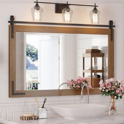 PRICES MAY VARY. Please Note: The overall size is 41 x 26 x 0.67 inches, and the display size of the glass mirror surface is 35.6 x 18.7 inches. The iron bracket hardware of the mirror’ top is non-sliding. It means that the mirror will not move left or right along the track. 【Rustic and Vintage Design】Mestikits farmhouse bathroom mirrors feature a classic style with a wooden frame enhanced by the small black metal details. The brown farmhouse style mirror is a perfect blend of rustic and modern, Round Wood Framed Mirror Bathroom, Farmhouse Mirrors For Bathroom, Farmhouse Bathroom Mirror Ideas, Mirrors For Bathroom Vanity, Rustic Bathroom Mirror, Living Room Courtyard, Frame Bathroom Mirror, Wooden Bathroom Mirror, Wall Decor Mirrors