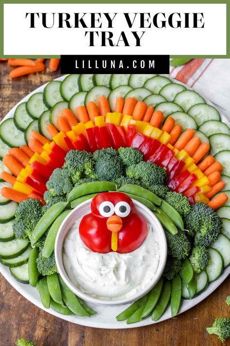 This adorable Turkey Veggie Tray is so simple, even the kids can help! It's a perfect centerpiece for your Thanksgiving spread. #turkeyveggietray #veggietray #thanksgivingappetizers #appetizer #thanksgiving Turkey Vegetable Tray, Turkey Veggie Platter, Thanksgiving Veggie Tray, Appetizer Thanksgiving, Turkey Veggie Tray, Thanksgiving Veggies, Veggie Appetizers, Thanksgiving Spread, Thanksgiving Vegetables