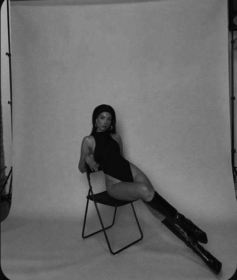 Black And White Chair Photoshoot, Black And White Themed Photoshoot, Posing With Chair Photo Shoot, Sitting Down Photography, White Boots Photoshoot, Chair Fashion Photography, Sitting Model Poses Chair, Chair Model Poses, Photoshoot With A Chair