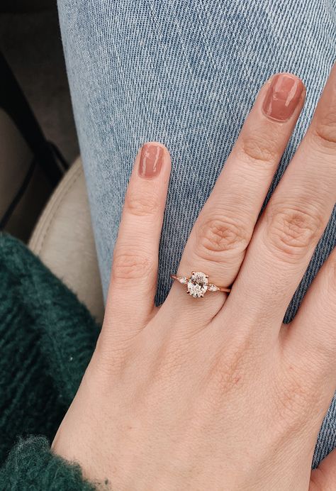 oval diamond, rose gold engagement ring Pale Gold Engagement Rings, Dainty Engagement Rings Gold, Simple Rose Gold Engagement Ring, Dainty Engagement Ring Gold, Dainty Oval Engagement Ring, Oval Rose Gold Engagement Ring, Oval Engagement Ring Rose Gold, Golden Engagement Ring, Rose Gold Engagement Ring Simple