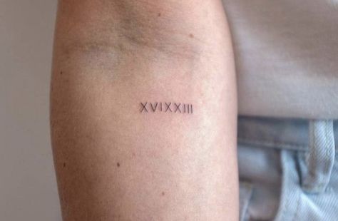 Modern Roman Numeral Tattoo, 22 Roman Numeral Tattoo, Fine Line Tattoo Roman Numerals, Roman Numeral Birthday Tattoo Kids, 22 Roman Numeral, Dainty Roman Numeral Tattoo, Roman Numeral Birthday Tattoo, Birthdate Tattoo Ideas, Roman Numeral Birthday