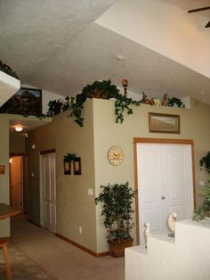 Rubber Plant This easy-to-grow indoor house plant will grow into an eight-foot-tall tree for a major pop of greenery in a room. Description from pinterest.com. I searched for this on bing.com/images Living Room Ledge Decor Vaulted Ceilings, High Shelf Decorating, High Ledge Decorating Ideas, Plant Ledge Decorating, Ledge Decorating Ideas, Log Home Living Room, Plant Ledge, Ledge Decor, Shelf Decorating