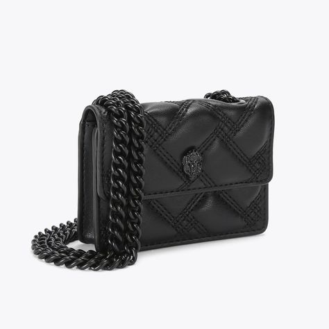 The Micro Kensington is crafted from a faux lambskin leather with signature parquet padded overstitch quilt with three rows of weave pattern. The black egle head features crystals and black bead eyes on the front flap. 2.8in (H), 3.9in (L), 0.8in (D)Strap drop cross body: 48.4inBlack metal chain strapMagnetic snap closure hidden under flapBlack metal branded plate on the backCan fit classic credit cardsOuter: Faux leatherInterior: Monogrammed interior liningStyle number: 9548600999 Outfits Gorditas, Outfit Pieces, Hand Bags For Women, My Style Bags, Micro Bags, Luxury Bags Collection, Pretty Shoes Sneakers, Handbag Essentials, Baggage Claim