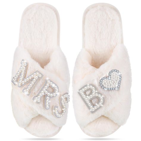 PRICES MAY VARY. Letters Bridal Slippers: our wedding slippers are designed in a variety of letter styles, you can choose your personalized initial slippers, and they are suitable for bridal shower, bridesmaid party, bridal party, also ideal for sleeping, bathing and leisure, comfortable and wear resistant, let you wear the feeling of clouds, white fluff and shining rhinestones can easily match your morning gown, let you shine at any time One Size Fits Most: the bride slippers measure about 9.65 Wedding Slippers For Bride, Wedding Day Letter, Pearl Slippers, Letter Styles, Bridesmaid Slippers, Bridal Slippers, Bride Slippers, Shower Slippers, Fluffy Fabric