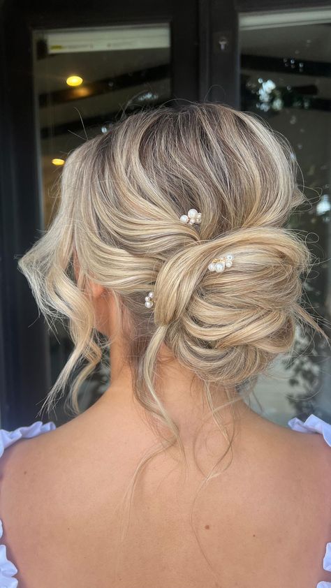 Jay Kay Braids & Bridal | Tousled bridal updo ft our best selling Pismo Hair Pins 🤍 💍✨ . Wedding hair, bridal hair, updo, bridal hair accessories, pearl… | Instagram Low Updo Wedding Hair Short, Wedding Hair For Bridesmaids Short, Blonde Upstyle Wedding, Bridal Updos For Long Hair Half Up, Loose Wedding Updo With Veil, Twisted Bridal Updo, Boho Wedding Dress Hairstyle, Bride Hair Updo With Headpiece, High Updo Wedding Short Hair