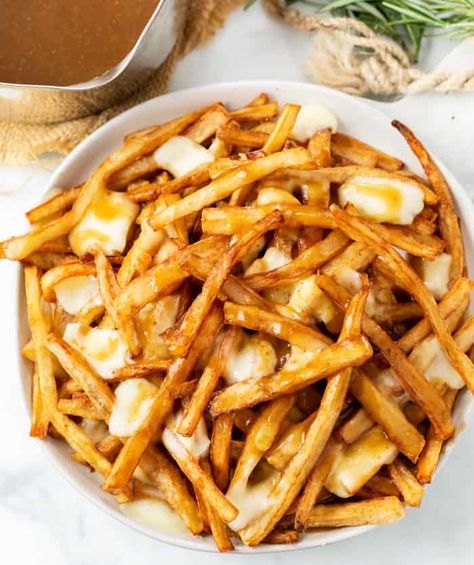 This Canadian Poutin includes a recipe for Homemade French Fries and an easy Brown Gravy! Add cheese curds or mozzarella, and find ideas on what to add to Poutine including pulled pork, Avocado, Bacon, and more! #appetizerideas #sidedishideas #snacks #frenchfries French Fries Recipe Homemade, Homemade Poutine, Gravy Recipe No Drippings, Canada Thanksgiving, Homemade Beef Gravy, Brown Gravy Recipe Easy, Beef Gravy Recipe, Easy Brown Gravy, Canadian Poutine