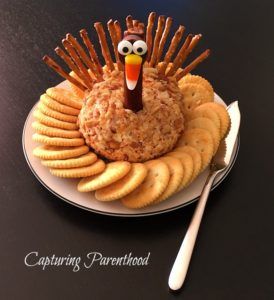 Thanksgiving Turkey Cheeseball, Turkey Cheeseball With Pretzels, Cheese Ball Turkey Shape, Turkey Cream Cheese Ball, Turkey Hors D’oeuvres, Turkey Tail Cheese Board, Turkey Dessert Board, Cute Thanksgiving Decor, Thanksgiving Turkey Cheese Ball