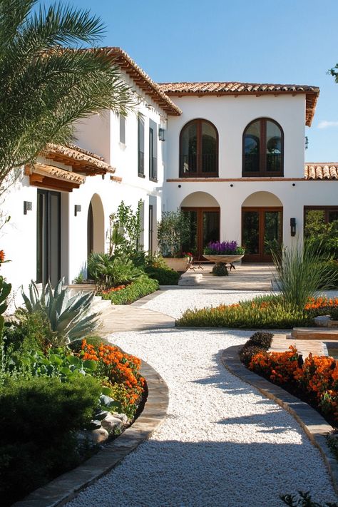 Spanish vila courtyard. View enchanting Spanish villas transform a dream home into a Mediterranean oasis with authentic architectural details and vibrant decor. Modern Spanish Home Exterior Mediterranean Design, Spanish House Entrance, Spanish Villas Exterior Architecture, Spanish European Home, Mediterranean Homes Small, Hacienda House Exterior, Mediterranean Modern Homes, Spanish Revival Home Exterior, Spanish Villa Home Exterior