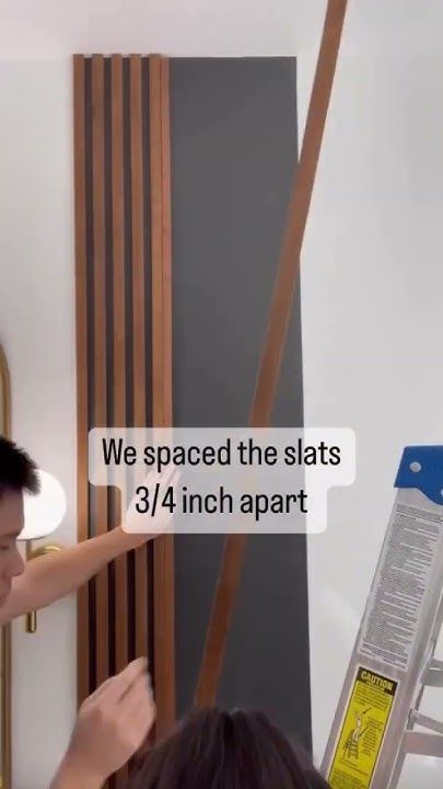 DIY Affordable Wood Slat Accent Wall || Cost Breakdown: Sanded Plywood - $25, Stain - $7 - YouTube Strip Wood Wall, Striped Wood Wall, Black Slat Accent Wall, Plywood Slat Wall, Diy Wooden Accent Wall, Slat Wall Vaulted Ceiling, Farmhouse Slat Wall, Diy Wood Slat Wall Bedroom, Wood Panelled Walls Living Room