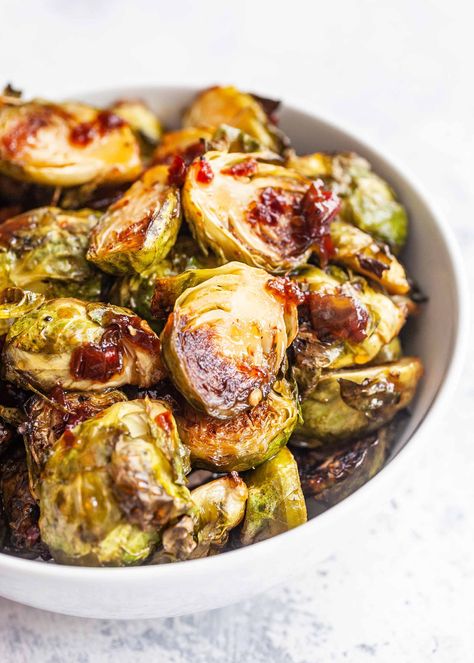 Spice up your holiday table with these Honey Chipotle Brussels Sprouts. They're roasted in the oven, then tossed with honey-chipotle sauce in the last few minutes of cooking for a spicy spin on a classic. Roasted Brussels Sprouts Recipe, Sauteed Brussel Sprouts, Brussel Sprout Recipes Roasted, Honey Chipotle, Sprouts Recipe, Roasted Brussels Sprouts, Roasted Brussel, Chipotle Sauce, Sprout Recipes