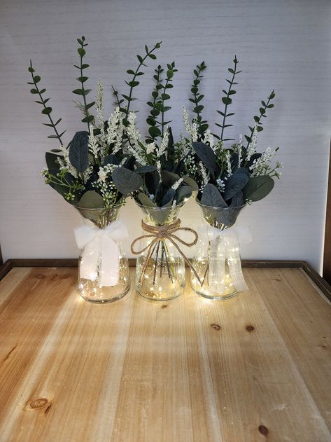 Eucalyptus Greenery Lighted Bud Vase Centerpiece Wedding - Etsy Canada Cheap Wedding Table Centerpieces Simple, Vase Fairy Lights, Eucalyptus Beach Wedding, Fairy Light Glass Vase Centerpiece, Earthy Centerpieces Wedding, Table Centerpieces For Baby Shower Boys, Eculyptus Table Centerpieces, Milk Jar Centerpieces, White Table Centerpiece Ideas