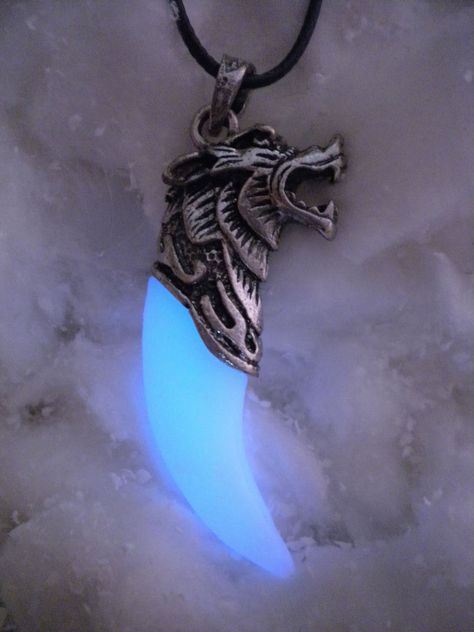 "A glowing fang of a Wolf turned into a Necklace. A symbol of his Spirit forever kept close to your heart. This is the ideal piece for any animal lover. (This is NOT a real animal fang. NO animals were hurt).  The glowing fang will hold a charge for some time after being left in the light for a few minutes. It gets more powerful if charged with real sunlight, but normal house lighting will allow it to charge as well. Keep in mind that it gets weaker over time and, after the initial high glow per Totem Necklace, Phoenix Jewelry, Wolf Tooth, Character Clothes, Phoenix Necklace, Bff Jewelry, Pretty Knives, Dark Jewelry, Wolf Necklace