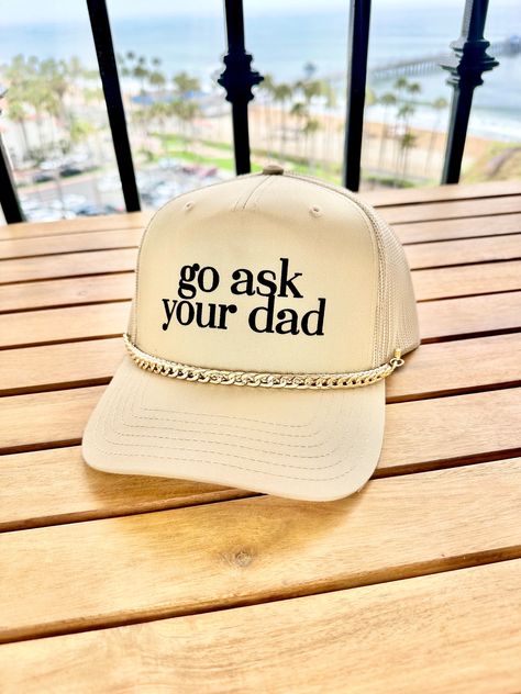 Go Ask Your Dad  Khaki Trucker Hat, adjustable hat, SnapBack, funny Hat  The lettering is super unique raised velvety suede like texture!  Please message us with any ideas.  Front: 65% Polyester 35% Cotton  Back: 100% Polyester Mesh Structured Firm Front Panel 5 panel cap Seamless Front Panel with Full Buckram 6 Rows Stitching on Visor Matching Fabric Undervisor Matching Color Sweatband Plastic Adjustable Snap Size: OSFM - Adult (58cm/22.8") Funny Trucker Hat, Custom Trucker Hats, Mom Hats, Funny Hats, Cute Shirt Designs, Hat Ideas, Mom Style, Adjustable Hat, Trucker Hats