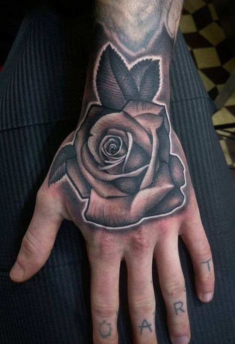 Rose tattoo 20 ideas for men: Unlocking masculine symbolism and timeless elegance Black And Grey Rose Tattoo Realistic, Rose Tattoo For Hand, Rose Tattoo In Hand, Real Rose Tattoo, Rose Reference Black And Grey, Angel Rose Tattoo, Shading Tattoo Ideas, Rose Tattoo Realistic, Realism Rose Tattoo