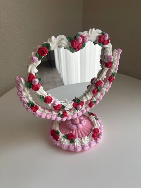 "This cake is perfect for bathroom selfies, on a cute shelf or on a vanity <3 Products used: lightweight spackle, acrylic paint, mirror,  Dimensions: 9.7\"L x 5.8\"W" Crafts Using Spackle, Paper Mache Room Decor, Clay Room Decor, Cute Vanity Mirror, Valentines Heart Cake, Food Mirror, Decorating Mirror, Cake Mirror, Paint Mirror