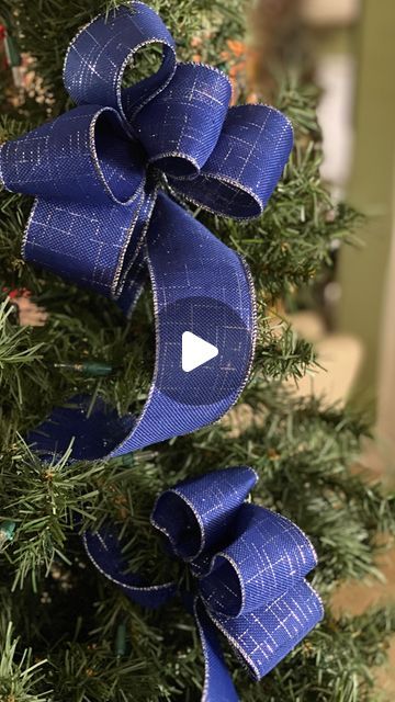 Michelle Dulevich on Instagram: "Save this for later if you need a really easy way to ribbon your tree. There’s so many ways you can do it, but this is one of the easiest and looks very elegant when done.❤️🎄  #christmas #turorials #christmastutorials #xmas #christmastreedesigner #christmasdiydecor #christmasdesign #christmas2024 #christmasdecor #christmasdecorationideas #christmasdecorating #christmastreedesigner #christmastreedecorating #christmastreeideas #holidaydecor #holidaybusiness #holidaydecorating  #seasonaldecorating" Red White Blue Christmas Tree Ideas, Christmas Tree Ideas Navy Blue And Gold, Fabric On Christmas Tree, How Much Ribbon For Christmas Tree, Christmas Tree Blue And Silver Ideas Decorations, Diy Christmas Bows For Tree, Ribbon In Trees Christmas, Ribbon Bow On Christmas Tree, Silver White And Blue Christmas Tree