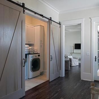 Hall Laundry Room with Gray Wash Barn Doors on Rails Hall Laundry, Bar Doors, Cottage Laundry, Cottage Laundry Room, Grey Laundry Rooms, Hallway Laundry, Black Countertop, Laundry Doors, House Pics