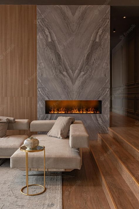 Premium Photo | Living room marble wall fireplace and stylish bookcase in chic expensive interior of luxury country house with a modern design with wood and led light gray furniture with gold elements Luxury Fireplace, Living Room Marble, Stone Wall Design, The Melody, Grey Furniture, Living Room Scandinavian, Stylish Living Room, Modern Fireplace, Marble Fireplaces