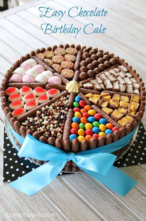 An easy chocolate birthday cake decorated with chocolate biscuits, lollies, marshmallows and chocolates! This really is a chocoholics delight! Maltesers Cake, Torte Creative, Chocolate Birthday Cake, Cake Hacks, Torte Cupcake, Homemade Birthday Cakes, Easy Birthday, Nice Ideas, Birthday Cake Chocolate