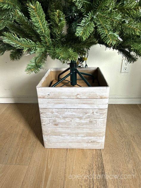 Easy $1 DIY elevated Christmas tree box stand to make a tree taller in small space home decor. Modern rustic wood planter made with cardboard! - A Piece of Rainbow, Christmas decorations, Christmas trees, home decor, holiday, hacks, boho, farmhouse, elegant, beautiful Diy Box For Christmas Tree Stand, Diy Christmas Tree Collar Wood, Elevated Christmas Tree Stand, Christmas Tree In Planter Ideas, Diy Tree Stand Christmas, How To Make Christmas Tree Taller, Christmas Tree Box Stand Diy, Make Christmas Tree Taller, Elevated Christmas Tree