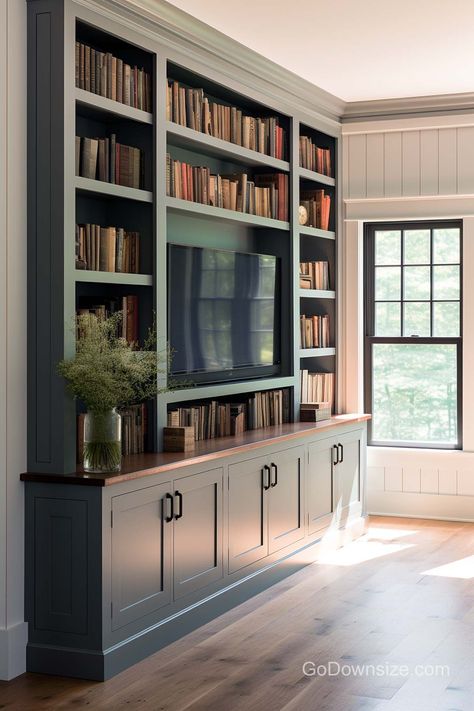 25 Great Built-In Bookshelves That Look Amazing Building Library Bookshelves, Bookcase With Tv Built In, In Built Bookshelves, Bookshelves With Storage Below, Built In Shelves Bonus Room, Built In Black Bookshelves, Library Accent Wall, Built In Bookcase Around Tv, Bedroom Wall Bookshelves