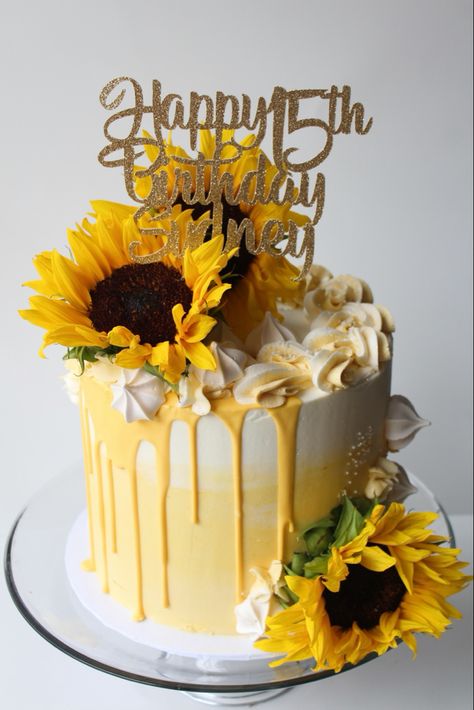 Yellow and white ombré buttercream, yellow drips, pearl sprinkles, sunflowers Yellow 21st Birthday Cake, Sunflower Cake And Cupcakes, Sunflowers Birthday Cake, Sunflowers Cake Ideas, Yellow Cake Decoration Birthday, Sunflower Bday Cake, 5 In 1 Torte Cake, Sun Flower Birthday Cakes, Sunflower Design Cake