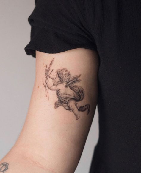 Greek Tattoos Aphrodite, Cherub Holding Flowers Tattoo, Cherub Tattoo Arm, Realistic Cherub Tattoo, Cherub With Flowers Tattoo, Angel Statue Tattoo, Victorian Tattoo Ideas, Cherub Angel Tattoo, Cherub Tattoo Designs