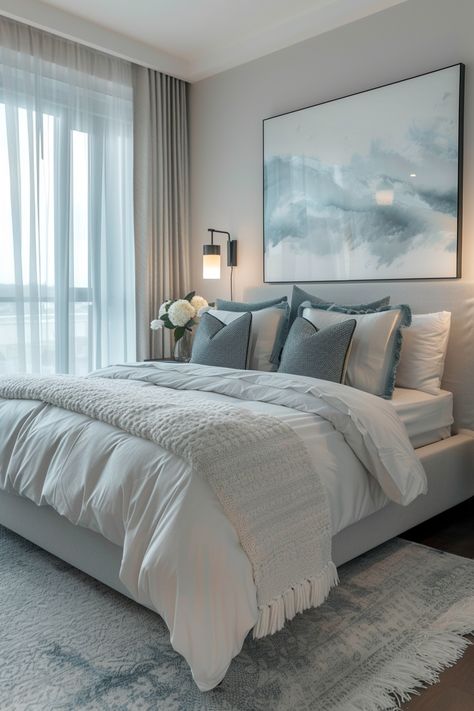 Transform Your Bedroom: Modern Elegance with a Touch of Blue and Grey Master Bedrooms Decor White Bed, Grey Bed With White Bedding, Light Grey Master Bed, Modern Bedroom White And Grey, Home Decor White And Grey, Grey And White Apartment Aesthetic, Blue Grey Master Bedrooms Decor, 10 By 13 Bedroom Ideas, Grey And Light Blue Bedroom Ideas