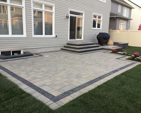 Pavers Around Deck, Backyard Step Down Patio Ideas, 2 Level Paver Patio Ideas, Step Down Patio Backyards, Patio Along Back Of House, Patio Stone Steps, Pacer Patio Ideas, Backyard Concrete Patio Ideas With Steps, Backyard Patio With Steps From House