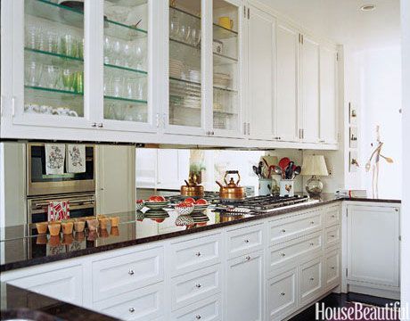 A mirrored backsplash in this Manhattan apartment gives the illusion of more space. Design: Faye Cone Mirrored Backsplash, Galley Kitchen Design, Galley Kitchens, Mirror Backsplash, Ideas Hogar, Galley Kitchen, Perfect Kitchen, Chic Kitchen, Shabby Chic Kitchen