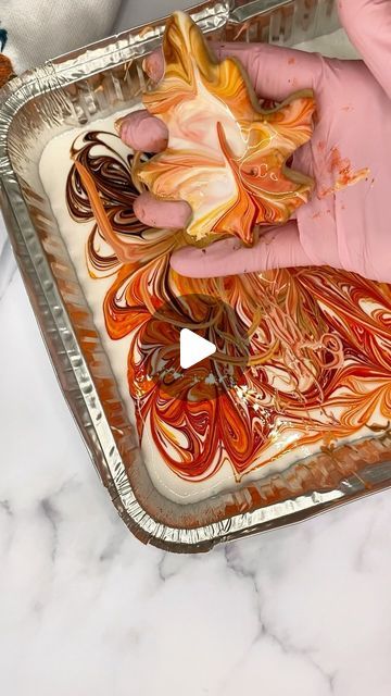 Sweet Sisters on Instagram: "The leaves are slowly starting to change! 😍  Each morning is a new beauty to see 🍁 

In honor of such, here is a quick and fun way to make some marbled fall leaf cookies! I poured my medium-flood consistency royal icing into an aluminum pan , added multiple food coloring , swirled and dipped 🍁 
Fun for kids too! 
.
.
.
#fall #fallleaves #fallcookies #fallfoilage #leafcoookies #cookies #cookiedecorating #cookietips #royalicing #fallbaking #bake" How To Make Brown Color Icing, Royal Icing Fall Leaves, Maple Royal Icing, Swirl Royal Icing Cookies, Fall Leave Cookies, Cutout Cookies Frosting, Fall Leaf Cookies Decorated, Leaf Cookies Royal Icing, Fall Decorated Cookies Royal Icing