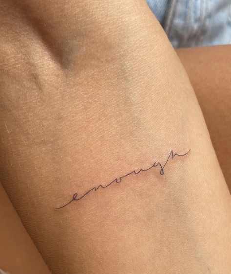 Cursive Minimalist Tattoo, Tattoo Ideas Female Self Worth, Enough Cursive Tattoo, Cursive Fine Line Tattoo Font, Minimalist Tattoo For Healing, Tattoo Below Elbow Crease, Tiny Cursive Tattoo, Dainty Word Tattoos For Women, Minimalist Tattoo Font