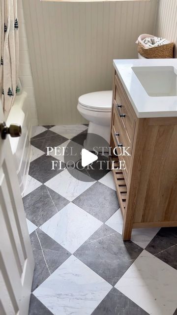 Nattie Jo Powell on Instagram: "Comment “TILE” and I’ll send you the link🔗 to these gorgeous peel & stick floor tiles!!  This is by far my favorite diy bathroom upgrade we’ve done and I love when a project is both budget friendly and holds up well!   #peelandstick #peelandstickflooring #bathroommakeover #renterfriendly #diy" Peel And Stick Flooring Laundry Room, Bathroom Remodel Peel And Stick Tile, Grout Peel And Stick Floor Tile, Bathroom Floor Stick On Tile, Renter Friendly Bathroom Floor, Peel And Stick Floor Tile Bathroom Diy, Diy Bathroom Floor Peel And Stick, Stick On Floor Tiles Bathroom, Floor Pops Peel And Stick Bathroom