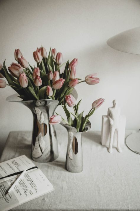 Bloom Botanica is a series of stainless steel vases shaped like an open flower, designed by Danish designer Helle Damkjær as a tribute to Bloom Bowl, a Georg Jensen piece made 20 years ago. Discover more form Georg Jensen! Scandinavian Spring Decor on the dining table. #georgjensen #minimaldesign #homedecor #candleholder #weddinggiftidea #springdecor #scandinavianliving Spring Design Ideas, Scandinavian Design House, Scandinavian Spring, George Jensen, Bohemian Style Interior, Open Flower, Minimalist Interior Style, Minimalist Flowers, Vase Shapes