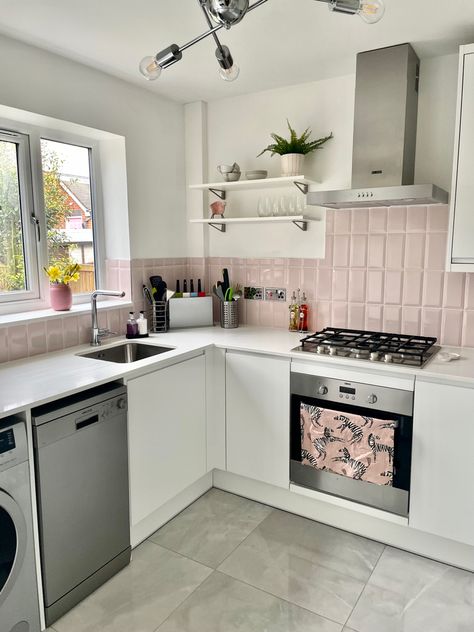 Pink kitchen tile inspiration Light Pink Kitchen Tiles, Grey Kitchen Pink Tiles, Grey Kitchen Pink Accents, Pink Cabinets Black Countertop, Blush Pink Kitchen Tiles, Minimalist Pink Kitchen, Pink Small Kitchen, Pink And White Kitchen Decor, Black White And Pink Kitchen